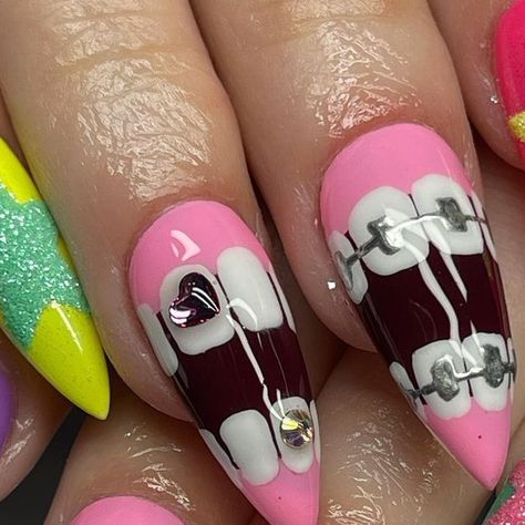 Groovy Nails by Bea 🌼 on Instagram: "MY SHINY TEETH & ME 🦷 inspo via the greats @rebeccapaintsnails & @tengoku_nails 💓 #nailart #nailsofinstagram #nailspo #naildesign #nailtech #explorepage #explore #longnails #detroitnails #detroit #michigannails #handpaintednails #apresgelx #apresnails #gelnails #gelxnails #halloweennails #sugarednails" Teeth Nail Art, Long Funky Nails, Teeth Nails Art, Teeth Nails, Shiny Teeth, Groovy Nails, Nail Sunny, Henna Nails, Punk Nails