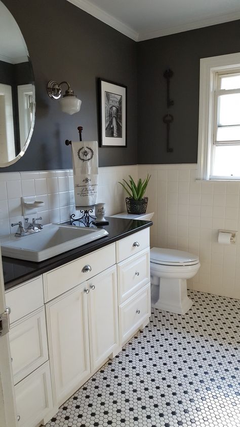 Black and white hex tile floor. Cabinet color is swiss coffee and walls are Kendall Charcoal, both by Benjamin Moore. Incorporated design with existing wall tile from 1969. Black Bathrooms, Bathrooms Floors, Black And White Tile, Vintage Style Bathroom, Gray And White Bathroom, Black White Bathrooms, Bathroom White, White Bathroom Tiles, Bathroom Black