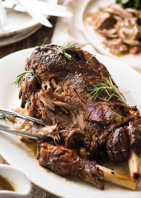 Slow Roast Leg of Lamb - ultra easy, ultra tender meat to pull off the bone, served with a luscious gravy. www.recipetineats.com Slow Roasted Lamb Shoulder, Leg Of Lamb Recipe, Lamb Roast Recipe, Roast Leg Of Lamb, Slow Roast Lamb, Roast Lamb Leg, Lamb Recipe, Lamb Leg, Leg Of Lamb