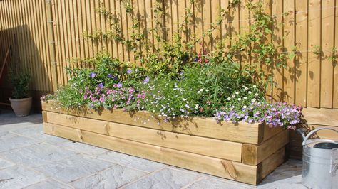 How To Build A Raised Garden Bed With Sleepers | Jacksons Fencing | Jacksons Fencing Garden Sleepers, Sleepers In Garden, Garden Bed Layout, Garden Retaining Wall, Garden Water Feature, Building A Raised Garden, Back Garden Design, Garden Design Plans, Low Maintenance Garden