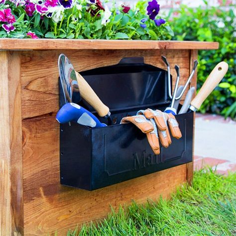 Attach a mailbox to the side of your planter to keep all gardening essentials close by. #Lowes #Storage #Gardening #Mailbox Mailbox For Garden Tools, Garden Mailbox For Tools, Garden Tool Box, Old Garden Tools, Old Mailbox, Easy Backyard Diy, Mailbox Ideas, Garden Tool Organization, Outdoor Water Feature