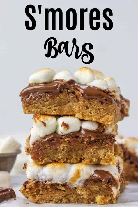 These easy homemade S'mores bar are the perfect summer dessert! They start with a graham cracker blondie and then topped with Hershey's milk chocolate bars and marshmallows. Toast them under your broiler for a S'mores dessert recipe your family will love! Best S’mores Bars, Chocolate Marshmallow Bars, Graham Cracker Bars, Smores Cookies Bars, Chocolate Bar Recipe, S Mores Bars, Smore Recipes, Homemade Graham Crackers, Hershey Chocolate Bar