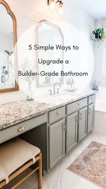 Kimberly Niarhakos on Instagram: "⭐️ 5 easy ways to make major changes to your builder-grade bathroom without spending a fortune!! ‌ ✨ Comment { 𝙻𝙸𝙽𝙺 } to have all the items I used for this glow up sent to your DM’s!! ✨ 1. Remove builder grade mirror -Add framed Mirrors 2. Update faucets 3. Change lighting 4. Paint cabinets & add new hardware 5. Paint, and or add accent wall/walls with wallpaper, shiplap, etc. ‌ 🌻 Full blog post tutorial 🌻 over on the blog linked in my bio if you want to see more details to this makeover!! 🫶🏻 Have a great Wednesday friends!! 💛 . . . . . #augustvibesharing . #LTKhome #homeswithsoul #homestyle #homeswithcharacter #homeblogger #diyhomeprojects #diyinspo #diyinsporation #vintagestylehomes #homestyle #homedesignideas #loveyourhome #easyhomedecor #i Adding Hardware To Bathroom Cabinets, Easy Bathroom Vanity Makeover, Repaint Builder Grade Cabinets, Master Bath Ideas Builder Grade, Small Builder Grade Bathroom Remodel, Guest Bathroom Ideas Decor Builder Grade, Contractor Grade Bathroom Makeover, How To Upgrade Builder Grade Cabinets, Tile Around Bathroom Vanity