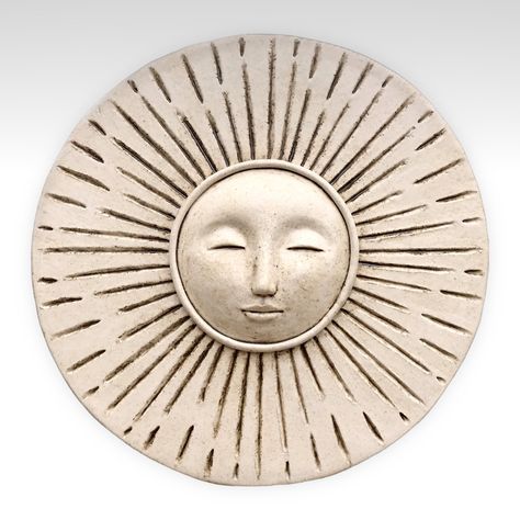 Ceramic sun face sculpture Sculpted and carved by hand, by me, with no molds.  Fired twice in my kiln at over 2,000 degrees  Measurements: 8 inch diameter  Satin-matte creamy white glaze  (colors may vary on different screens and in different lighting) Includes hanging wire on back and hook and nail for the wall  Safe outdoors in temps above freezing (or in a covered area) and protected from high winds Ceramic Wall Art Sculpture, Pottery Sun, Pottery Wall Art, Ceramic Sun, Clay Wall Hanging, Face Sculpture, Sun Wall Decor, Ceramic Mask, Pottery Wall