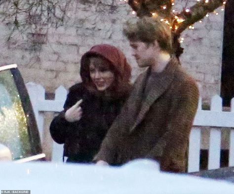 Taylor Swift makes a rare appearance with beau Joe Alwyn and brave wet weather to enjoy date night | Daily Mail Online Joe Alwyn, On Date, Wet Weather, The Rain, Brave, Date Night, Taylor Swift, Swift, Christmas