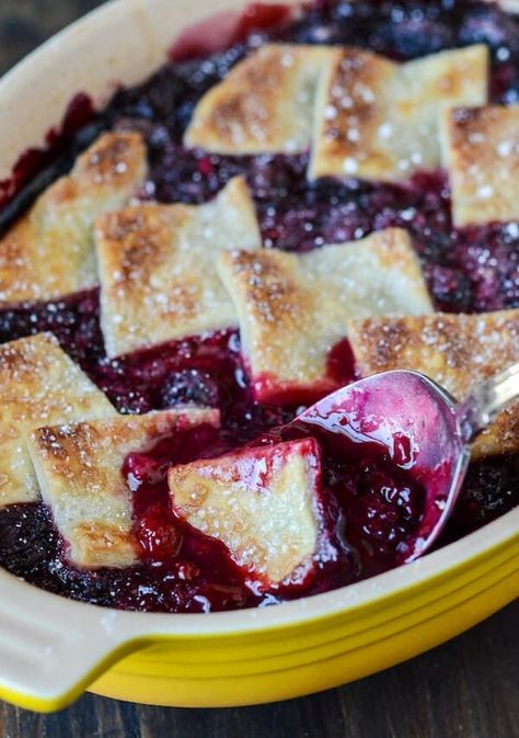 Growing up I remember helping my grandmother make cobblers, specifically berry cobblers. We would go pick wild berries for hours and come home and make a big cobbler to be served after dinner with a huge scoop of vanilla ice cream. Sometimes, we even made the ice cream from scratch with the big old ice … Berry Cobbler Recipes, Cherry Cobbler Recipe, Blackberry Cobbler Recipe, Cobbler Recipes Easy, Store Bought Pie Crust, Blackberry Recipes, Berry Cobbler, Fruit Cobbler, Blueberry Cobbler