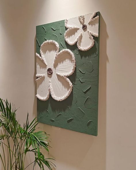 Each piece in the series is crafted on a cotton and linen canvas using acrylic paints to create textured, three-dimensional floral designs that pop against their backgrounds. 🔍 Product: Milly Flowers 3D Wall Art 👆 Tap the link in bio for more wall art pieces! . . . . . . . . . . . . . . . . . . #decorcrushing #interior4u #interior4inspo #sassyhomestyle #inspireushomedecor #housedecoration #mywestwingstyle #moderninteriordesign #dailydecordose #chicinteriors #homedesigns #lightingdesign #drea... Art Pieces Painting, Wall Paint Designs Creative Art Ideas, Clay On Canvas Art, Canvas On Wall, Texture Art On Canvas, Textured Art Canvas, Wall Painting Canvas, Homemade Wall Art, 3d Canvas Art