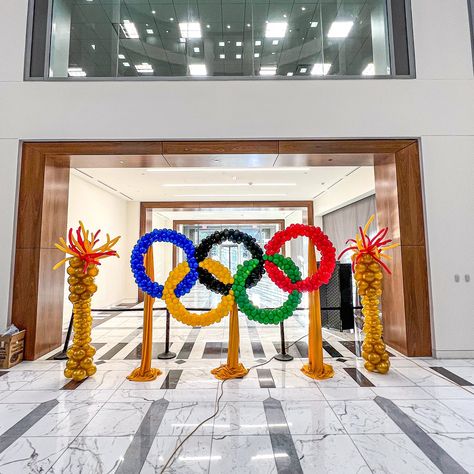 WE’RE GOING FOR GOLD! 🏅🎉 We’re beyond excited for the start of the Olympics and thrilled to have been a part of the action! 🎊 This morning, our team installed an incredible balloon display to celebrate the games and we couldn’t wait for you to see it! 🎈👀 . . #OlympicFever #TeamUSA #BalloonInstallation #OlympicDecor #GoingForGold #Paris2024 #OlympicGames #BalloonArt #EventDecor #SportsDecor” Balloon Bar, Olympic Theme, Olympic Torch, Balloon Display, Balloon Installation, Prom Theme, Going For Gold, Sports Decorations, Balloon Decor