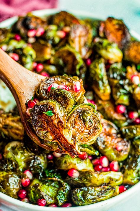 Balsamic Glazed Brussels Sprouts with Pomegranate Seeds - An easy side dish that's perfect for not only the holidays but anytime you're in the mood for CRISPY roasted Brussels sprouts!! The homemade balsamic glaze seeps into every inch of the spouts and adds so much tangy-sweet flavor!! Winter Brussel Sprouts, Roasted Brussel Sprouts With Pomegranate Seeds, Brussel Sprout Recipes With Pomegranate, Brussel Sprout Pomegranate Recipes, Roasted Brussel Sprouts With Pomegranate, Brussel Sprout Recipes Pomegranate, Roasted Vegetables With Pomegranate, Brussel Sprout With Pomegranate, Pomegranate Brussel Sprout Salad