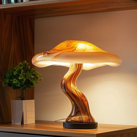 Introducing the “Fungi Glow Lamp,” inspired by the intricate beauty of mushrooms. Its eco-friendly design features a base resembling a mushroom stem and a translucent lampshade mirroring delicate mushroom caps, emitting a soft, enchanting glow. Each lamp is handcrafted, adding a touch of organic charm to any space. Conceptual AI Art Follow @ecosapiens for more! Mushroom Interior Design, Mushroom Furniture, Mushroom Lampshade, Mushroom Stem, Fantasy Cabin, Caduceus Clay, Mushroom Lamps, Coral Lamp, Glow Lamp