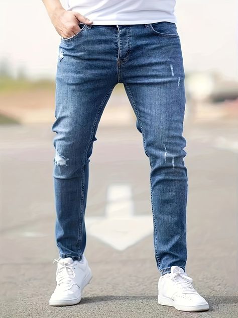 Experience modern style with our Blue Distressed Slim Fit Jeans - Oliver. These fashionable yet comfortable jeans are designed to give you a feeling of casualness and comfort. Perfect for everyday wear or special occasions, these jeans will add a trendy and striking touch to your wardrobe.        Distressed look for trendy style: The soft yet durable denim fabric ensures a comfortable feel, even on long days. The slim cut and mid-waist offer a comfortable and flattering fit, while the subtle rips and distressed look create a modern and unique look. These jeans are ideal for creating a stylish yet relaxed look that highlights your personality and individual style.    Versatile: These jeans can be effortlessly combined with t-shirts, shirts or elegant tops. They are perfect for different occ Stretch Denim Pants, Comfortable Jeans, Cooler Look, Casual Street Style, Slim Fit Men, Denim Fabric, Jeans Slim, Men's Casual, Slim Fit Jeans