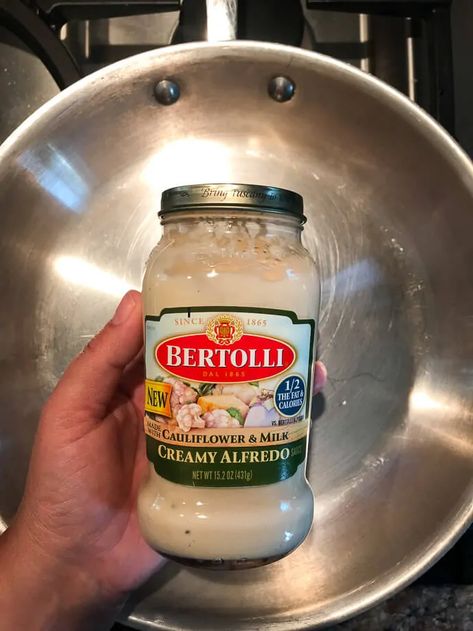 This easy Shrimp Alfredo recipe is one of my favorite 15 minute meals.  The best part is, it's a lighter version using one of this classic dish.  #itisakeeper #shrimp #alfredo #15minuterecipe Bertolli Alfredo Recipes Chicken, Alfredo Pasta Recipes With Jar Sauce, Bertolli Alfredo Recipes, Shrimp And Chicken Alfredo, Shrimp Alfredo Sauce, Alfredo Pasta Recipes Easy, Easy Shrimp Alfredo Recipe, Creamy Shrimp Alfredo, Fetuccini Alfredo