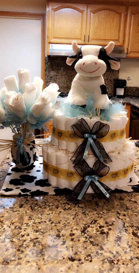 Cow Diaper Cake Baby Boy, Baby Cow Baby Shower Theme, Highland Cow Diaper Cake, Cow Print Gender Reveal, Gender Reveal Cow Theme, Cow Baby Shower Cookies, Cow Baby Shower Theme Boys, Cow Theme Gender Reveal, Cow Theme Centerpieces