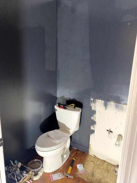 Midnight Blue Powder Room, Small Blue Powder Room Ideas, Two Tone Powder Room, Fun Half Bathroom Ideas Wallpaper, Navy Blue Small Bathroom Ideas, Navy Blue Half Bathroom, Half Bathroom Ideas On A Budget, Small Bath Paint Colors, Cheap Powder Room Makeover