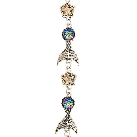 "Purchase the Metal Mermaid Tail Charms by Bead Landing™ at Michaels. Make an attractive wrap-around bracelet with these mermaid tail metal beads by Bead Landing. Make an attractive wrap-around bracelet with these mermaid tail metal beads by Bead Landing™. You can also pair these beads with colorful beads to create pretty necklaces and anklets. Details: Silver 10 mm starfish 28 mm tail size 7\" (17.7 cm) string length 7 mermaid and starfish beads Metal | Metal Mermaid Tail Charms by Bead Landing Bead Landing, Seashell Jewelry, Mermaid Tails, Strung Beads, Pretty Necklaces, Bead Stringing, Mermaid Tail, Metal Beads, Starfish