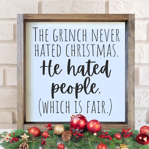 Design: The Grinch Never Hated Christmas. He Hated People (Which is Fair) This 13.5" x 13.5" hand-painted sign comes with a shadowbox-style frame and can stand alone on a shelf. It also comes ready to hang on a wall with a sawtooth hanger. All wood signs ship via USPS with free shipping. Please make sure your address is correct. NOTE: Each wood sign is hand-painted. No vinyl is used. Each sign is unique, takes 3-5 business days to create, and will vary slightly in appearance depending on wood gr Grinch Christmas Wood Signs, The Grinch Signs, Farmhouse Christmas Signs Diy, Cricut Christmas Signs Wood, Holiday Sayings For Signs, Xmas Signs On Wood, Grinch Wood Crafts, Diy Wood Christmas Decor, Christmas Signs And Sayings