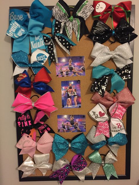 Cheer bow display cork board cheerleading bows Cheer Bows Display Ideas, Cheer Ribbon Display, Cheerleading Room Decor, Cheer Bow Display Graduation, Display Cheer Bows, Cheer Bow Storage Ideas, Cheer Bow Display Ideas, Cheerleading Room Ideas, Cheer Display Ideas