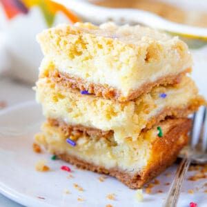 Sugar Cookie Cheesecake Bars - Belle of the Kitchen Sugar Cookie Cheesecake Bars, Golden Oreo Crust, Belle Of The Kitchen, Cookie Cheesecake Bars, Sugar Cookie Cheesecake, Chocolate Chip Cheesecake Bars, Cookie Cheesecake, Golden Oreo, Cheesecake Bar Recipes