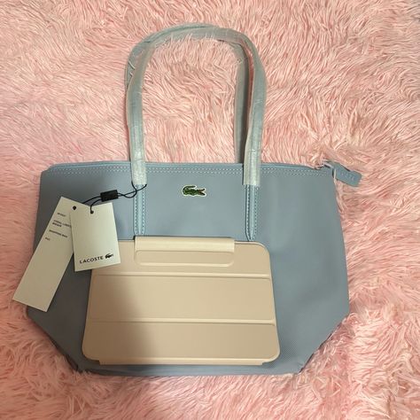 Bnwt Lacoste Small Zip Tote Color Please See Photo Light Blue/Skyblue Dimensions: L5.9 X H6.6 X D1.9" / L15 X H17 X D5 In One Interior Zip Net Pocket With Hook Embroidered Crocodile Branding Dimensions 24 X 24.5 X 14.5 Cm Exterior In Pvc Outside: Pvc (100%) Lacoste Bag Women, Lacoste Bag, Tote Bag Outfit, University Bag, Uni Bag, Lacoste Women, Photo Light, Girls Tote, Blue Handbags