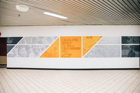 University of Tennessee: Arena Dining Lobby on Behance Office Wall Branding Ideas, University Wall Design, Environmental Graphic Design Wall, Wall Graphics Design, University Interior Design, Office Wall Graphics, Office Graphics, Interior Signage, Wall Of Honor