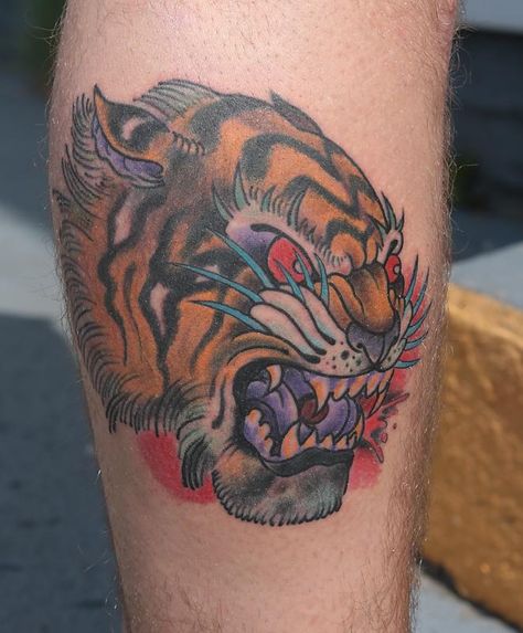 Tiger Tattoo awesome color scheme Working Class Tattoo, Tiger Soup, Tiger Tattoo Design Traditional, Traditional Tiger Back Tattoo, Tradition Tiger Tattoo, Sabertooth Tiger Tattoo Traditional, Traditional Tiger Face Tattoo, Mens Tiger Tattoo, Tattoo Knee