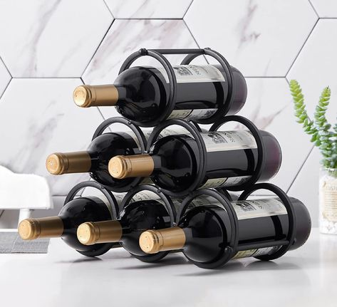 PRICES MAY VARY. - Tabletop wine rack for wine bottle decoration, fits any space and is easy to store. Simple utilitarianism that complements any decor, compact size, perfect for small spaces or countertops. -One set of wine racks can store up to 6 bottles of wine. -Freestanding wine rack made of high quality iron material. -Sturdy and durable to prevent shaking, tilting or dropping. Wine Rack