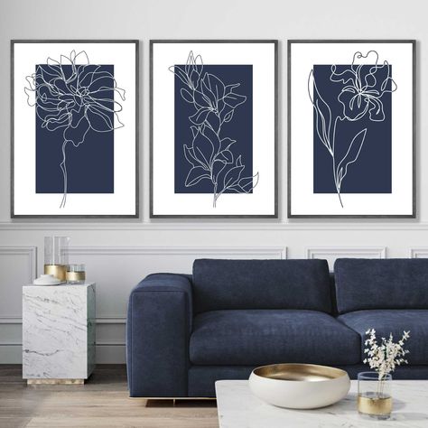 UK ONLY - To Add frames to your order use this listing: https://www.etsy.com/uk/shop/ArtzeUK?ref=simple-shop-header-name&listing_id=1042933907&section_id=24851926 Tip: Order the same size frames as prints Part of our Minimalist Collection, this Set of 3 Floral Posters in Navy Blue and White featuring hand drawn sketch flowers and plants in white works with many interior styles including Boho, Vintage and Minimalist. These prints are perfect for the Bedroom, Kitchen, Living Room, Dining Room or B Blue Living Room Accessories, Navy Blue Dinning Room Decor, Blue Wall Prints, Floral Posters, Botanical Line Art, Navy Blue Wall Art, Plant Wall Art, Navy Blue Walls, Drawn Flowers