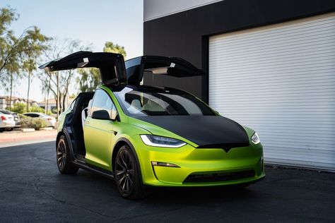 This 2022 Tesla Model X Plaid came in for paint protection and aesthetic improvement. We custom vinyl wrapped the vehicle with KPMF Metro Matte Dynamic Lime Green, vinyl wrapped the rear spoiler and side mirrors, painted calipers lime green with Tesla logos in 3M carbon fiber vinyl wrap, and did a full tint protection with Kavacha clear ceramic window tint. To top it off, we used Ceramic Pro on the wheels, calipers, glass, leather, plastics, and textiles! Tesla Wrap Colors, Tesla Model X Wrap, Mirrors Painted, Tesla Model X Plaid, Vehicle Aesthetic, Green Tesla, Painted Calipers, Tesla Wrap, Simulator Room