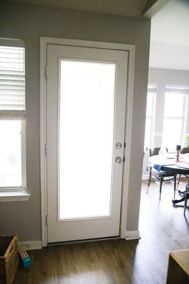 The back wall of our house has always been pretty dull. We recently gave our back door a makeover with a quick coat of paint, and it makes an incredible difference! Here are some quick tips on painting exterior doors - if you love this project, you can see more easy and affordable DIY ideas on my blog, Love & Renovations. Here's the before - our door wasn't in terrible shape, just boring! We decided to paint both the interior and the exterior of this door black - we wanted a high-co… Exterior Kitchen Doors, Beach House Entryway, Door Refresh, Door Stopper Diy, Single Patio Door, Backyard Door, Exterior Bathroom, Painted Exterior Doors, Exterior Door Designs