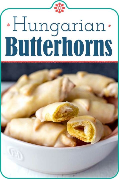 Hungarian Butterhorn Cookies! If light buttery cookies with a nutty filling are on your holiday must-have list, this is the cookie for you. Rolled up, filled will a walnut meringue, and dressed in a snowy glaze, these cookies are perfect with tea, as an afternoon snack, or part of a holiday cookie exchange. #simplyrecipes #cookies #butterhorn #holidayrecipes #christmascookies Butterhorn Cookies, Powdered Sugar Glaze, Instant Pot Cookbook, Holiday Cookie Exchange, Muffin Batter, Buttery Cookies, Meringue Cookies, Afternoon Snack, Holiday Cookie