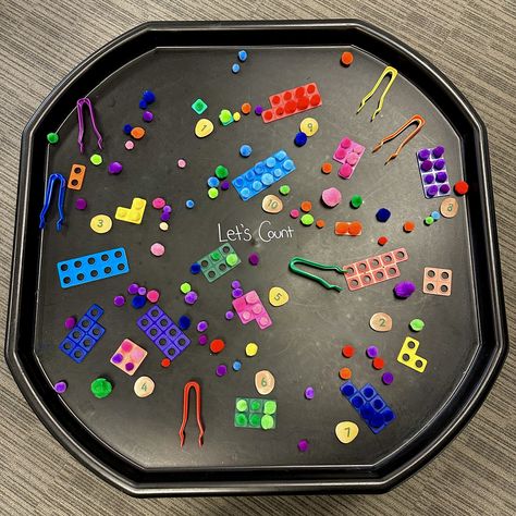 Pom Pom Count & Match 🌈 This activity is a fun and colourful way to practice fine motor skills, counting, number recognition and colour matching ✨ Simply lay out the ten frames on the tuff tray and pour pom poms all over the tray! Add number pebbles for children to count and match with the ten frames then add tweezers. 🔟 Invite your little learners to pick the Pom Poms up and match them with the coloured ten frames, they then can choose a corresponding number to match. #learningthroughpla... Tuff Tray, Ten Frames, Colour Matching, Number Recognition, Tweezers, Pom Poms, Fine Motor Skills, Fine Motor, Motor Skills