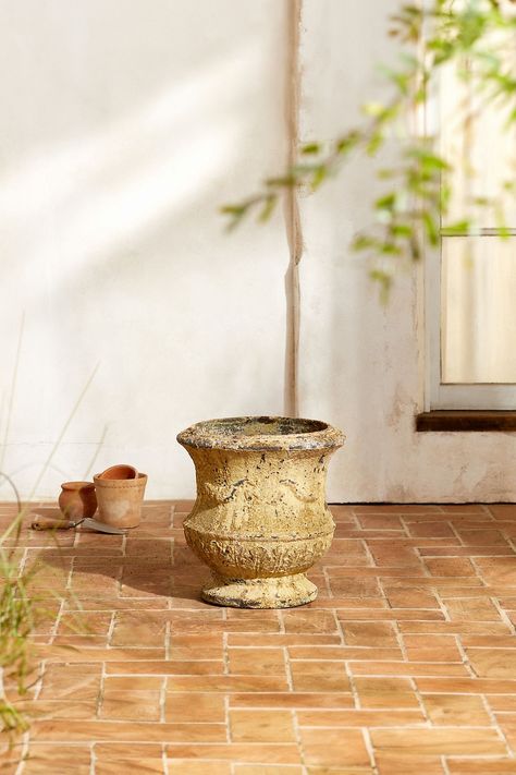 A fantastic addition to your garden, each of these weathered urns features a distinct maritime texture. An antiqued glaze will continue to change over time, adding to the pot's character and authenticity, while high-fired earthenware offers durability, strength, and resistance to frost. Pot Garden, Antiquing Glaze, Garden Planters, Earthenware, Garden Pots, Color Coding, Planter Pots, Glaze, Texture