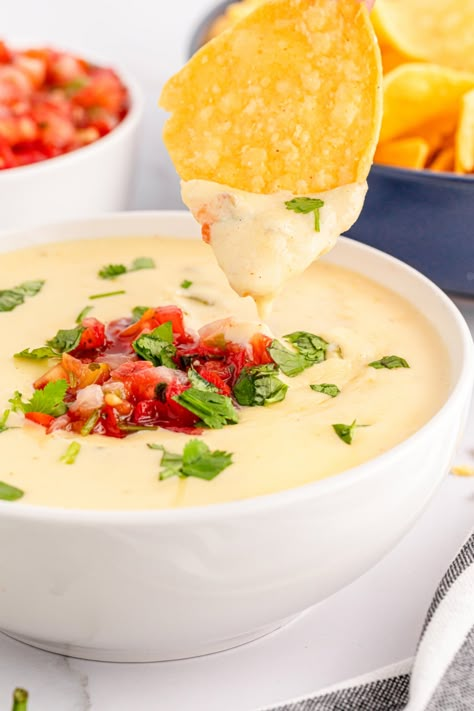 This Mexican White Queso Dip is the perfect appetizer for any party! The best part is that you can make this cheesy appetizer from scratch with just a few simple ingredients. Simple Queso Dip, Best White Queso Dip, Mexican Queso Dip White, Mexican Queso Dip, Queso Dip Recipe, Mexican Dips And Appetizers, Crockpot Queso Dip, Mexican Cheese Dip, Queso Dip Crockpot