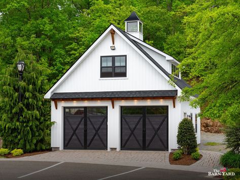 This 24' x 24' Newport Garage, on display at our Bethel location, has the coveted farmhouse feeling. Board & batten siding, black doors, windows, and accents, and a timber frame eyebrow roof create a rustic and refined appearance. This garage is available in New England only at a special package price of $89,700. Shown with options. 
.
#thebarnyard #customgarage #customgarages #newport #newportgarage #timberframeaccents #twocargarage #boardandbatten#farmhouse #garage #twostorygarage Eyebrow Roof, Barn Pool House, Post And Beam Cabin, Two Story Garage, Painted Garage, Barn Pool, House Columns, Timber Frame Pavilion, Timber Frame Design