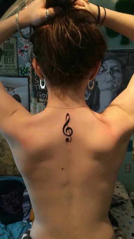 Treble clef tattoo Marching Band Tattoos Ideas, Simple Treble Clef Tattoo, Tattoo Treble Clef, Bass And Treble Clef Tattoo, Music Shoulder Tattoo, Choir Tattoo Ideas, Treble Clef Tattoo Behind Ear, Music Back Tattoo, Base Clef Tattoo