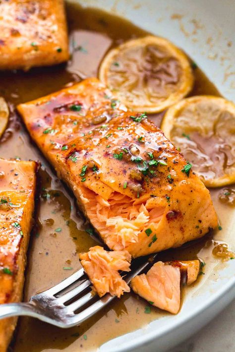 Honey Garlic Salmon is the easiest fish dinner you’ll ever make! It’s perfectly flaky with a sweet and salty honey soy glaze with lemon juice and melted butter. Honey Old Bay Salmon, Seafood Entree, Fried Salmon Recipes, Salmon Recipe Pan, Easy Fish Dinners, Salmon Recipes Oven, Soy Glaze, Best Salmon Recipe, Recipes With Soy Sauce