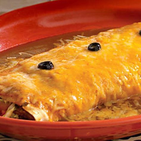 There is a fantastic Mexican restaurant nearby where I used to live in Indiana called the "Hacienda", and they are FAMOUS for their "wet burritos". (Which basically means they are SMOTHERED in cheese!!!! LOL!!) They are WONDERFUL!! Here is my very own homemade version of them! (These are big, but that's the way they serve them at the restaurant.) Don't let the lengthy directions fool you!! They are EASY to make!! Hope you try them! :) *You can also make these with ground beef, shredded chicken o Wet Burrito Recipes, Texmex Recipes, Burrito Sauce, Homemade Burritos, Wet Burrito, Mexican Enchiladas, Mexican Favorites, Boho Glam Home, Mexican Sauce