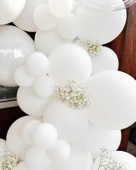 Elegant. Clean. Timeless. With hand-placed pearl details and traditional florals, this garland was custom made to celebrate a wedding rehearsal dinner. Thank you for choosing It’s Your Day to be part of your life milestones and celebrations. 🤍 - - - - - #itsyourday #balloons #balloonartist #balloongarland #customballoons #grabandgoballoons #birthdayballoons #balloonideas #creativeballoons #balloonstylist #quality #service #smallbusiness #wedding #weddingrehearsal #weddingballoons #wedding... White Balloon Arch With Flowers, Life Milestones, White Baby Showers, Pearl Details, Custom Balloons, Balloon Columns, White Balloons, Wedding Rehearsal Dinner, Wedding Balloons