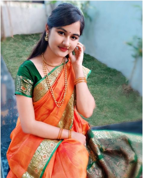 Maharashtrian saree look in evergreen orange and green saree. Orange And Green Saree, Maharashtrian Saree Look, Maharashtrian Look, Maharashtrian Saree, Long Blouse Designs, Instagram Captions For Friends, Indian Fashion Saree, Indian Sweet, Green Saree