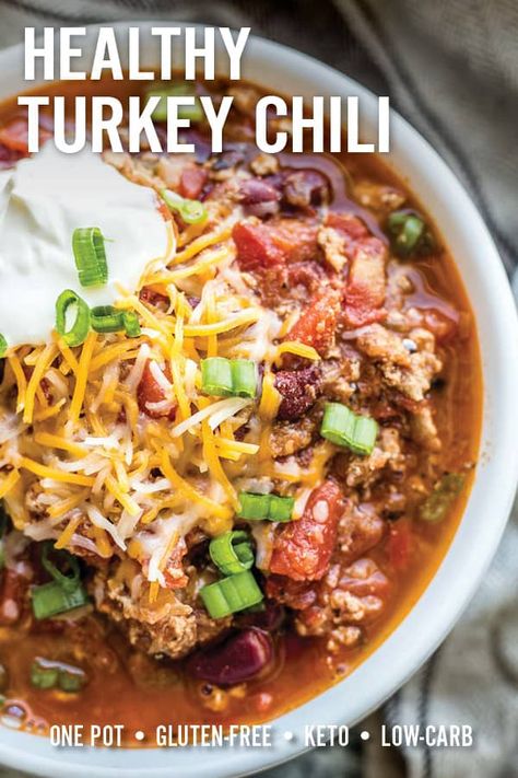 Wholesome classic healthy turkey chili loaded with flavor from simple ingredients commonly found in your pantry. This gluten-free chili is made in one pot and ready in less than 30 minutes for an easy weeknight meal. #turkeychili #chili #healthychili #comfortfood via @platingpixels Healthy Turkey Chili Recipe, Chili Turkey, Healthy Turkey Chili, Healthy Chili Recipe Turkey, Ground Turkey Chili, Chili Recipe Healthy, Turkey Chili Healthy, Slow Cooker Turkey Chili, Turkey Chili Recipe