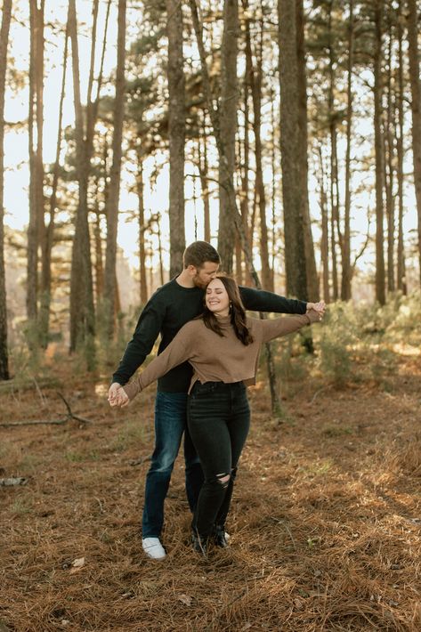 Green And Brown Couple Outfits, Trail Photoshoot Couple, Forest Engagement Shoot Outfit, Couple Poses In Woods, Engagement Photos Outfits Forest, Woods Couple Pictures, Couple Poses In Forest, Pine Tree Couple Photos, Outdoor Fall Couple Photos