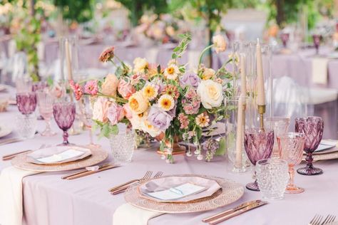 Read More: https://www.stylemepretty.com/2020/11/11/this-is-the-perfect-blueprint-for-how-to-do-a-pastel-wedding-color-scheme-oh-so-right/ Pastel Table Decor, Pastel Table Setting, Spooky Spring, Hyde House, 21 Dinner, Colored Taper Candles, Pastel Wedding Colors, Pastel Wedding Theme, Cottagecore Wedding