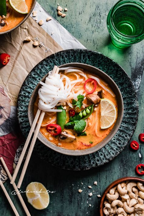 A bowl with Red Thai Curry Soup with vegetables. Food photography Thai Curry Food Photography, Thai Curry Photography, Thai Food Photography Style, Red Thai Curry Soup, Ibiza Food, Curry Photography, Thai Curry Soup, Soup With Noodles, Thai Food Photography