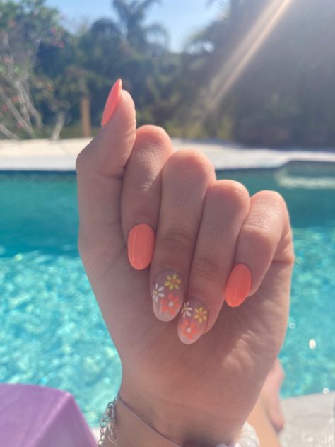 Peach Nails With Flower Designs, Summer Gel Nails Ideas Flowers, Coral Flower Nail Designs, Prom Nails Floral, Orange Nails With Daisies, Short Almond Acrylic Nails Flower, Orange And Flower Nails, Orange Nail Designs Short Nails, Pastel Orange Nails Design