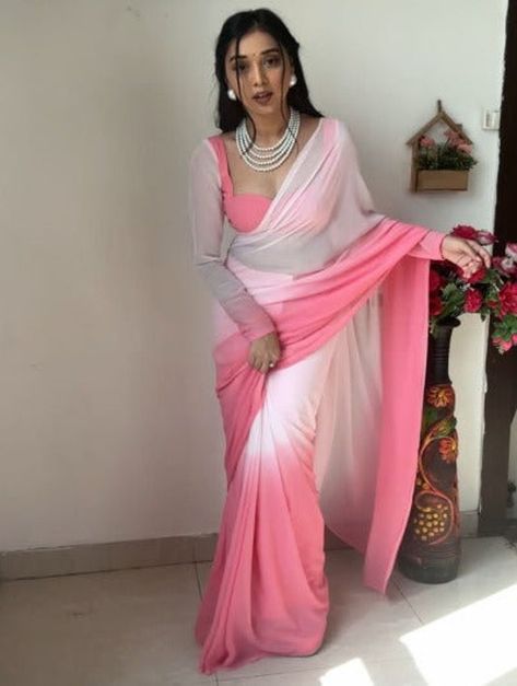 "1 Min Stitched Georgette Dual Shade Readymade Sari Fully stitched Saree with pleats and hook to adjust your waist easily( Wear it 1 Min -Ready to Go) Fits any waist size from 28 to 42 inch. Size & Fit WAIST MEASUREMENT Size of \"Wrap in a Minute Saree\" applicable Please check the size guide in images for measurement .There are extra hooks in waist to adjust your waist size for a comfortable fit. Saree Design Details: Readymade saree Bollywood Style Ready to wear in 1 Minute. ( Pls watch our video to see how to wear one minute saree) Shipping Info : Delivery in 8 to 14 days Wear your Saree in just under One Minute (This is fully stitched ready to wear saree) Disclaimer: The model is wearing a stitched version of the blouse piece. The saree comes with an unstitched blouse piece. Saree Mate Readymade Sari, Georgette Saree With Blouse, Stitched Saree, Saree Wearing, Saree Bollywood, Bridesmaid Saree, Lehenga Blouse Designs, Fancy Sarees Party Wear, Modern Saree