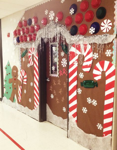 Christmas Holiday Door decoration, for school.  Gingerbread house door. I spent about $12 on this door decor (school provided paper) but took about 5 hours to do. But so worth it- all the kids really love it!   Thanks to a couple pinterest ideas I collaborated from! Diy Christmas Door Decorations, Holiday Door Decorations, Diy Christmas Door, Christmas Door Decorating Contest, Christmas Classroom Door, School Door Decorations, Christmas Door Decoration, Door Decorating Contest, Christmas Bulletin