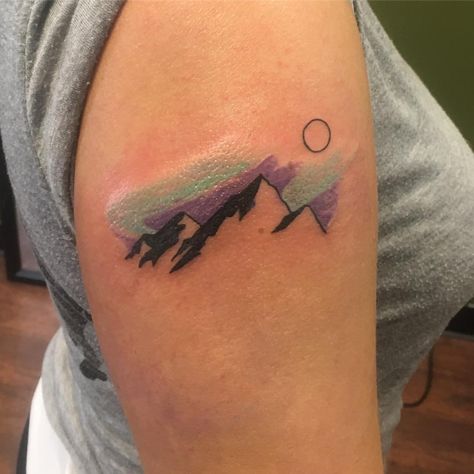 Mountain Northern Lights Tattoo, Lights Tattoo, Scenic Tattoo, Watercolor Mountains Tattoo, Simple Unique Tattoos, Aurora Tattoo, Northern Lights Tattoo, Moutain Tattoos, Small Mountain Tattoo