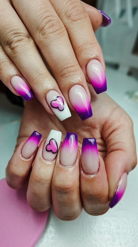 elebrate love in style with this enchanting set of acrylic nails! Featuring a soft milky pink base that elegantly fades into a plum ombre, these nails are adorned with playful pink and purple hearts near the tips, adding a whimsical touch. The smooth, glossy finish enhances their charm, while the blurred background with a heart-shaped object sets the perfect romantic vibe.
#nailsdesign #acrylicnails #septembernails #fallnails #autumnnails #nailsinspo Ombre Nail Art, Milky Pink, September Nails, Ombre Nail, Purple Hearts, Nail Art Ombre, Sweet Love, Blurred Background, Purple Heart