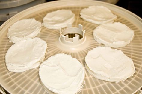 Dehydrated yogurt disk snacks. You could even spoon fruit on top to create a snack and yogurt snack. Sweet deal! Yoghurt Drops Dehydrated, Dehydrating Potatoes In Dehydrator, Dehydrating Yogurt, Dehydrated Yogurt Drops, Dehydrate Yogurt, Dehydrated Yogurt, Dehydration Recipes, Storing Food Long Term, Dehydrating Food Storage