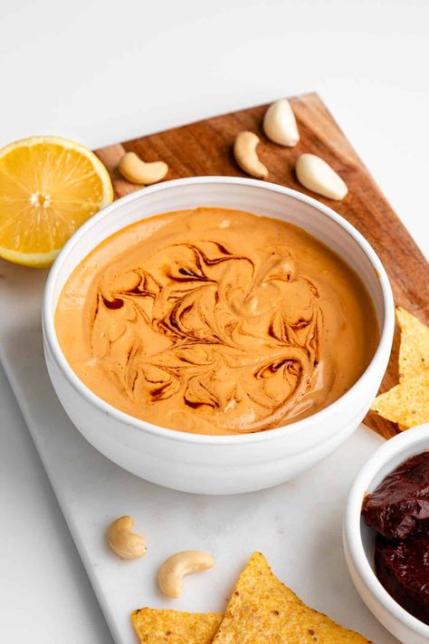 This vegan chipotle aioli recipe is easy, creamy, smoky, and spicy! It's a healthy condiment made with cashews and chipotle peppers in adobo sauce. Also known as chipotle sauce or cream, it's dairy-free, oil-free, and made without mayo. Use it as a dip, dressing, or spread with tacos, burritos, sandwiches, and burgers. Best paired with Mexican dishes! #chipotleaioli #aioli #chipotlesauce #vegan #dairyfree #chipotle #adobosauce #cincodemayo #mexicanfood Chipotle Aioli Recipe, Chili Salad, Chipotle Peppers In Adobo Sauce, Healthy Dip Recipes, Vegan Sauce Recipes, Cashew Cream Sauce, Vegan Chipotle, Cashew Sour Cream, Roasted Garlic Hummus